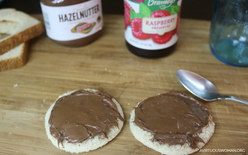 How to Make Homemade Uncrustables with Hazelnut Spread and Raspberry Preserves @ AVirtuousWoman.org